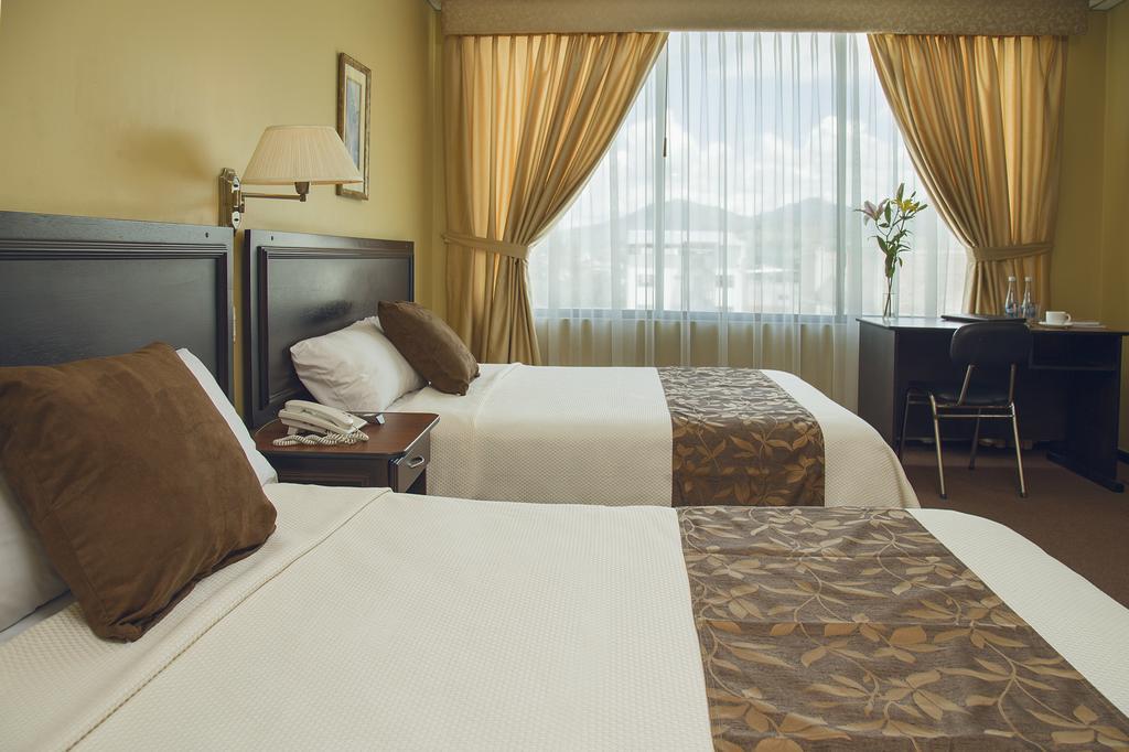 Hotel Podocarpus Лоха Номер фото